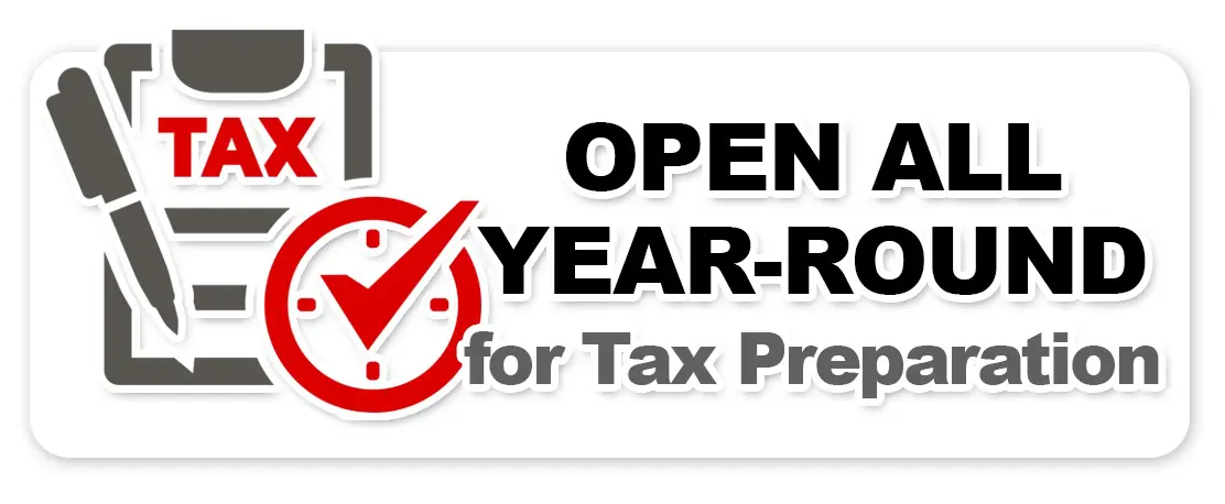 A sign that says open year-round for tax preparation.